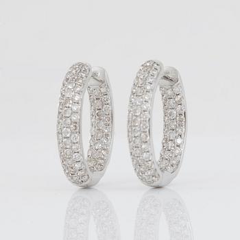 A pair of oval hoop diamond earrings, 1.71 cts according to engraving.