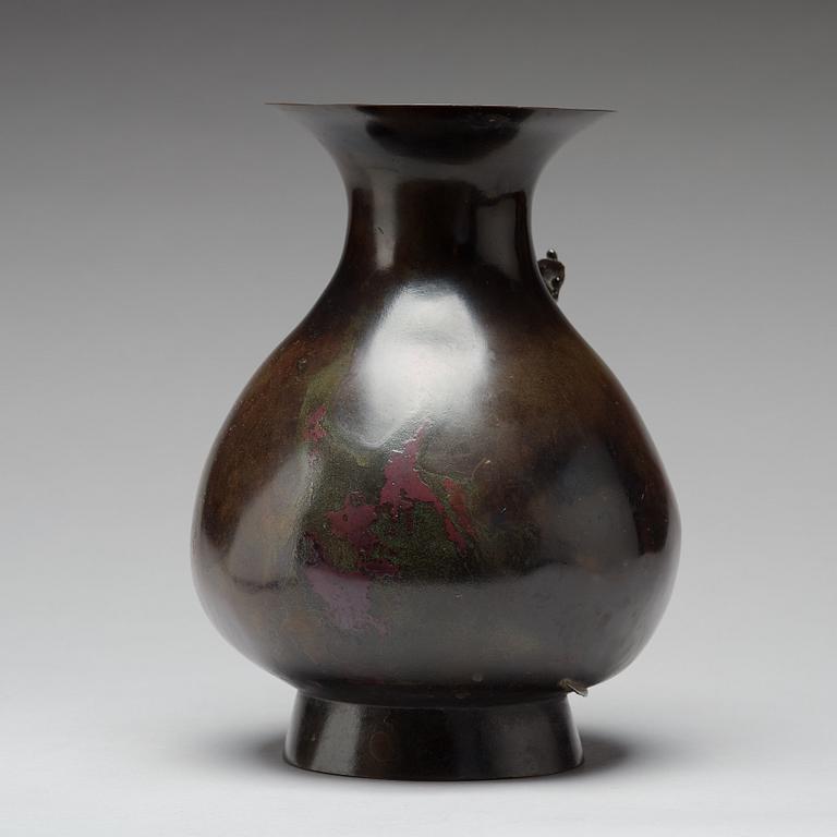 A bronze vase, presumably 18th Century.