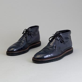 A pair of gents shoes by Louis Vuitton.