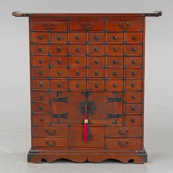 A contemporary Chinese spice cupboard.
