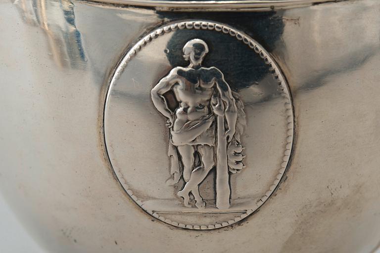A CREAMER, silver. Vague master mark. Stockholm 1796. Height 14 cm, weight 212 g.