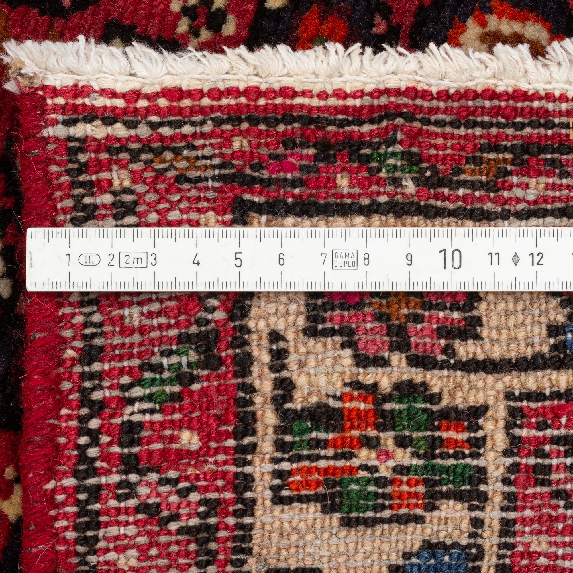 A Hosenabad runner, approximately 322 x 81 cm.