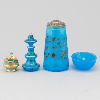 A silver gilt turkoise glass tankard, bottle with stopper, bowl and a small creamer, 19th Century.