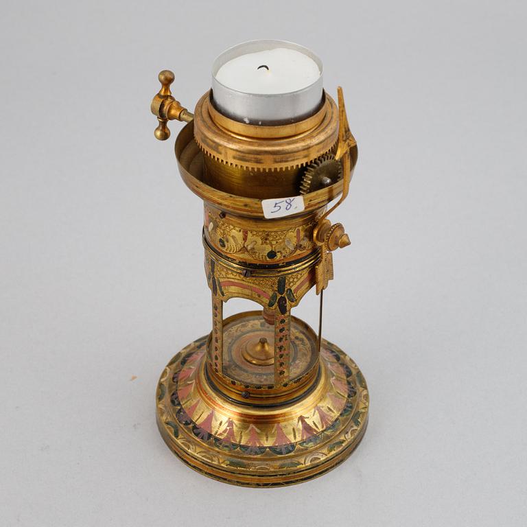 A late 19th Century night-light clock.