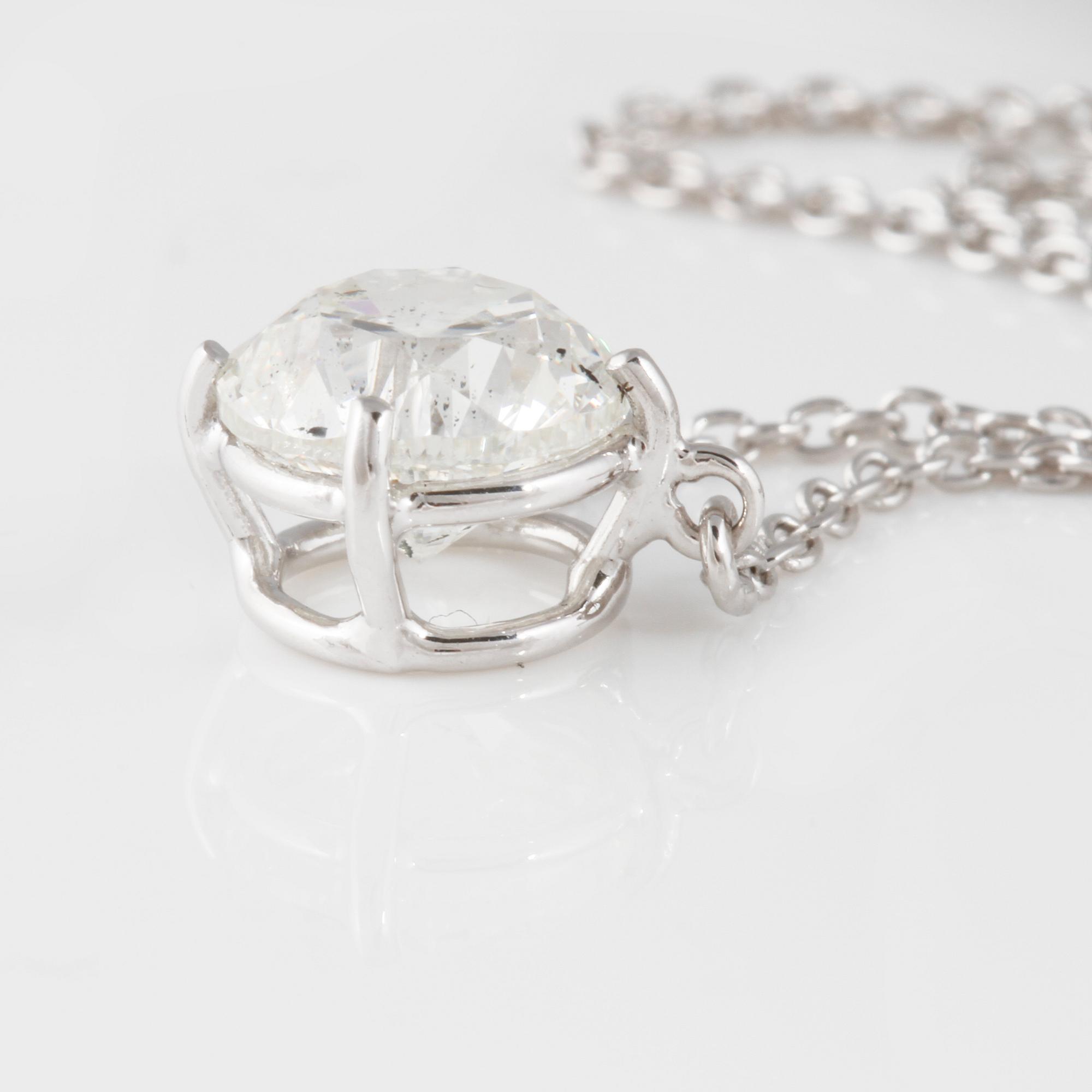 HÄNGE, med briljantslipad diamant ca 1.52 ct. Vikt 4,7 gram.