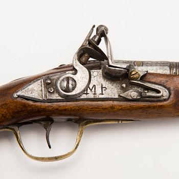 An early 19th Century flintlock pocket pistol.