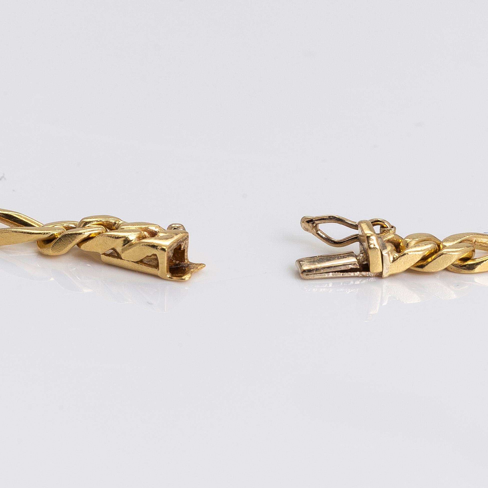 An 18K gold necklace, Foreign hallmarks.