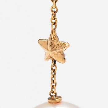 OLE LYNGGAARD, An 18K gold earring pendant "Shooting stars" with a tahiti pearl and diamonds ca. 0.06 in total. Denmark.