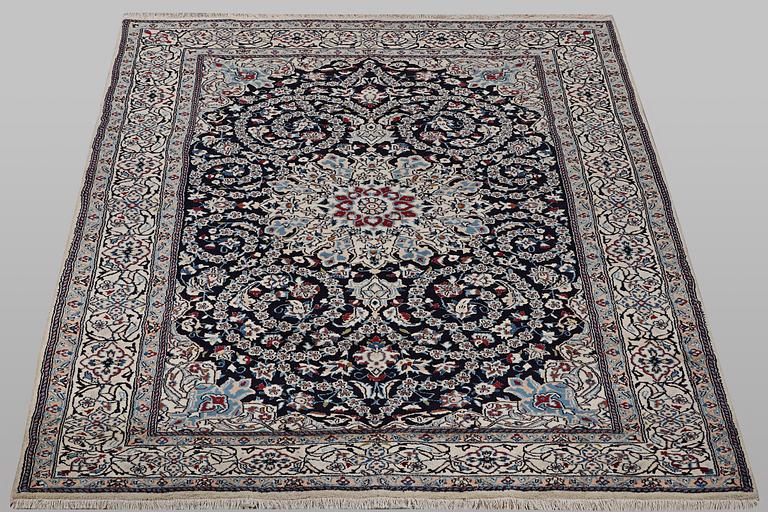 A carpet, Nain, part silk, 9 Laa, ca 295 x 197 cm.