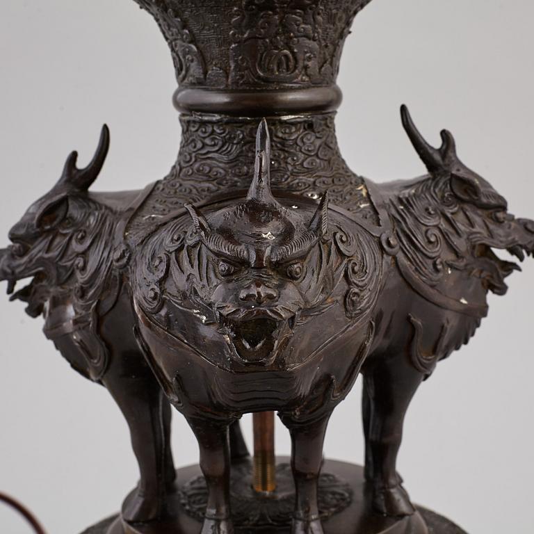 A Japanese bronze incense burner/pagoda, turned into a table lamp, 20th century.