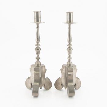 Firma Svenskt Tenn,  a pair of 1928 pewter candle sticks.