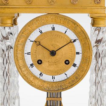 A french late Empire mantelpiece clock, first half of the 19th century.