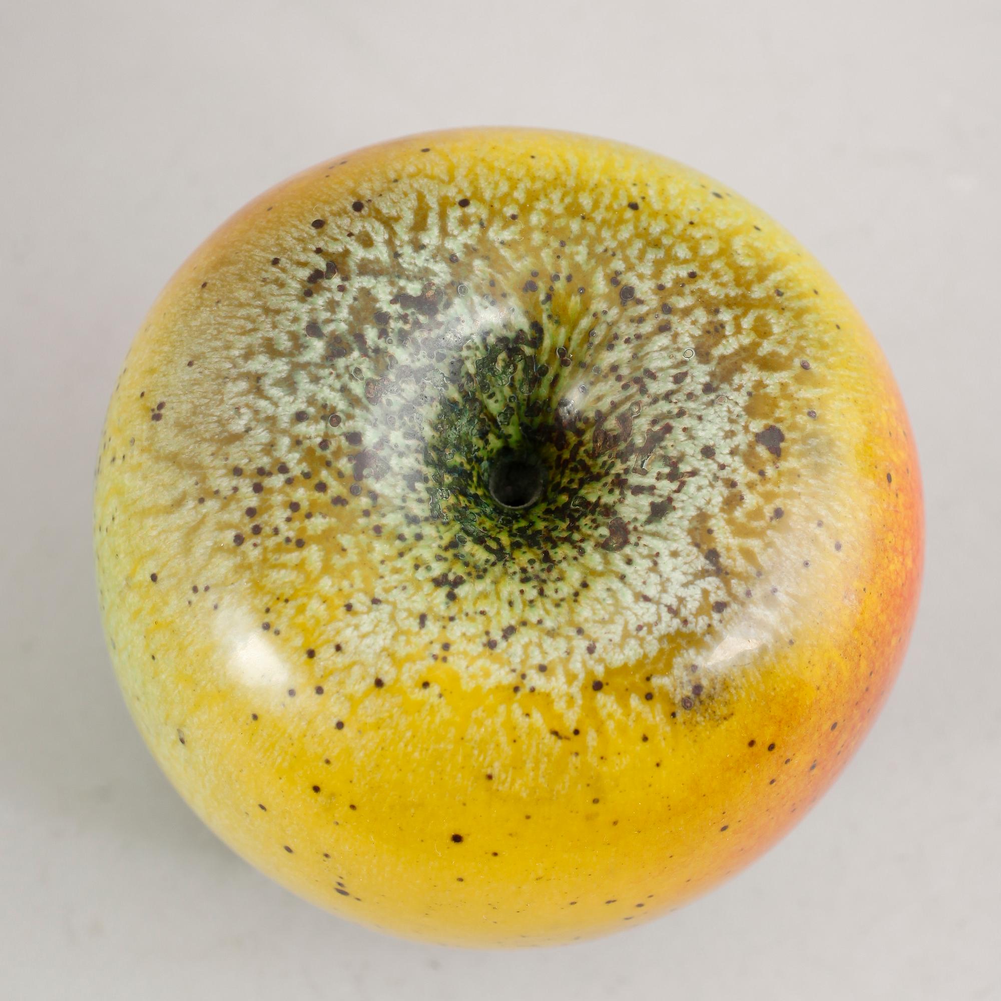 A Hans Hedberg faience apple, Biot, France.