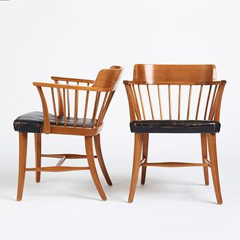 Josef Frank, a pair of mahogany and black leather 'Captain's chair', Svenskt Tenn, model 789B, acquired in 1950.