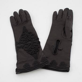 PRADA, a pair of ladies embellished black leather gloves.