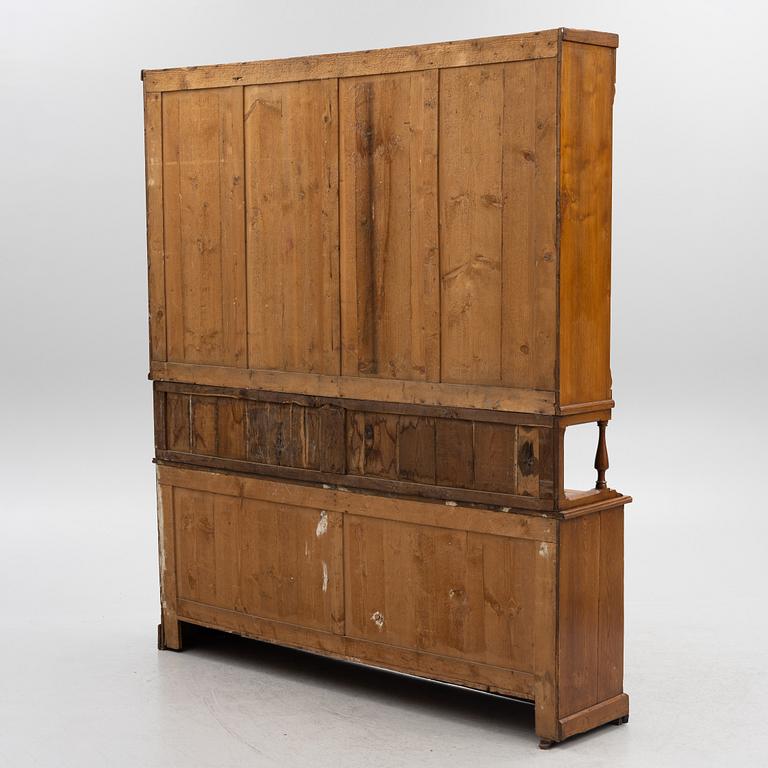 A display cabinet, circa 1900.