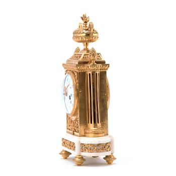 A Louis XVI circa 1780 mantel clock.