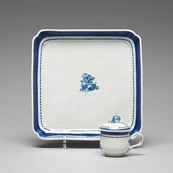 A set of nine blue and white custard cups with covers and a tray, Qing dynasty, Jiaqing (1796-1820).