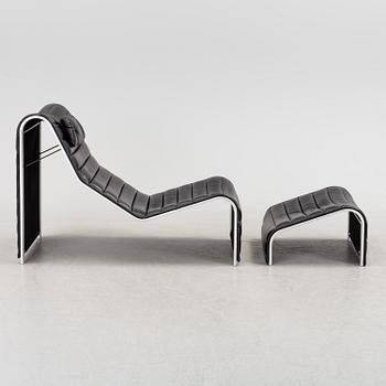 ERIC SIGFRID PERSSON, a leather upholstered lounge chair and foot stool from Möbelkultur AB.