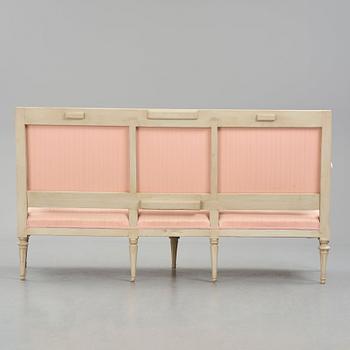 A Gustavian carved sofa, later part of the 18th century.