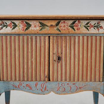 A painted pine table marked E.S.D 1833.