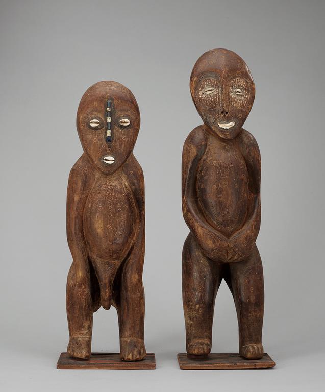 A set of two 20th Century African wood figure.