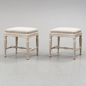 A pair of gustavian late 18th century stools by Erik Öhrmark (master in Stockholm 1777-1813).