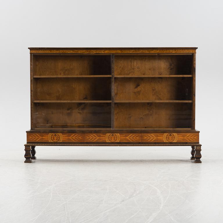 A stained birch veneered book cabinet, first half of the 20th Century.