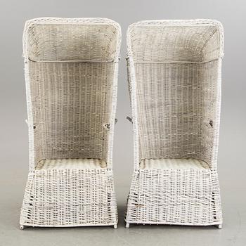 Basket chairs / armchairs, a pair of, early 1900s .