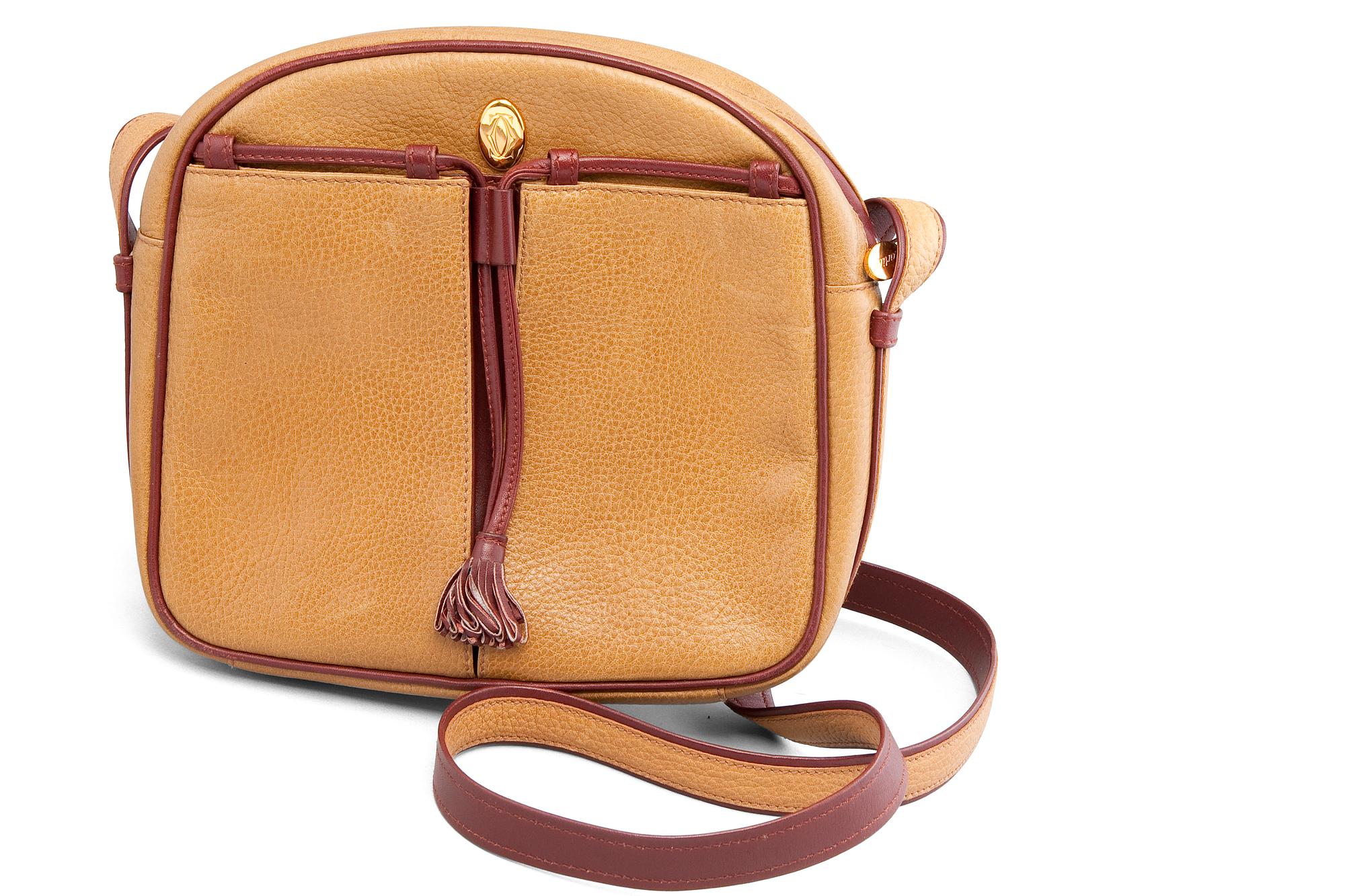 A HANDBAG, Cartier.