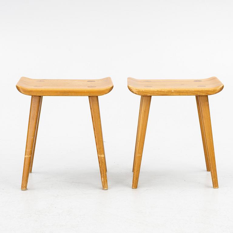 Carl Malmsten, a pair of "Visingsö" stools, Svensk Fur, second half of the 20th century.