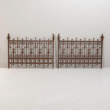 A cast iron two part fence around 1900.