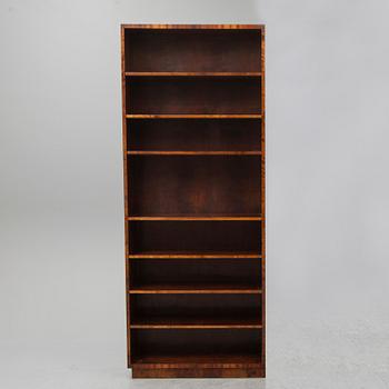 A  1930's stained birch bookshelf.