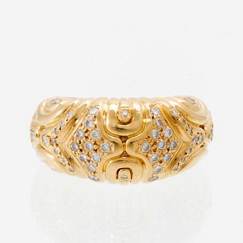 An 18K gold ring set with round brilliant-cut diamonds, London.