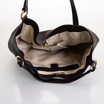 Gucci, an "Interlocking G" bag.