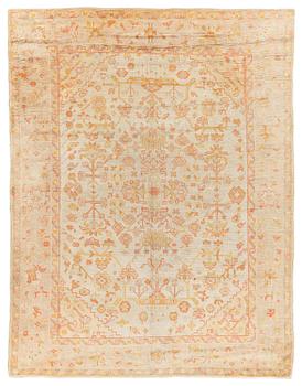 An antique Ushak carpet, c. 335 x 259 cm.