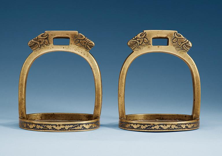 A pair of bronze stirrups with enamel, Qing dynasty, 19th Century.