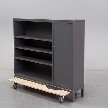 A first half of the 20th Century painted book case.