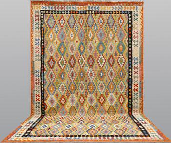A kilim carpet, ca 486 x 304 cm.