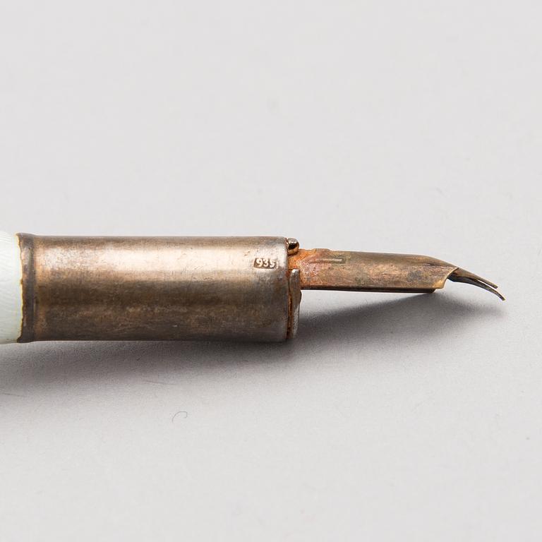 A silver case, Nikolai Kemper, and a pen and a paper knife in silver and enamel, import marks St Petersburg early 1900s.