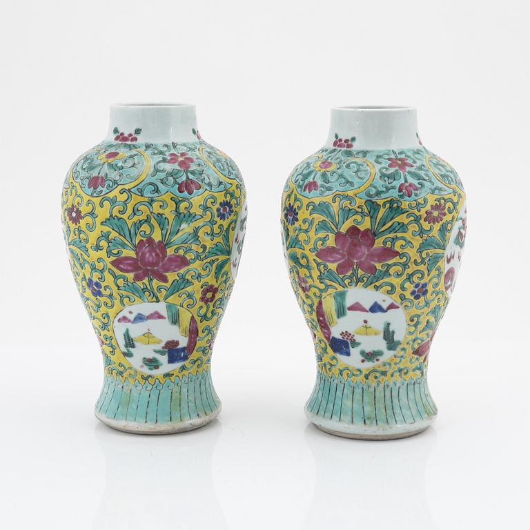 A pair of famille rose vases, China, early 20th Century.