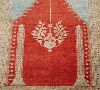 MATTO, an antique silk Tabriz, ca 165 x 122,5 cm.