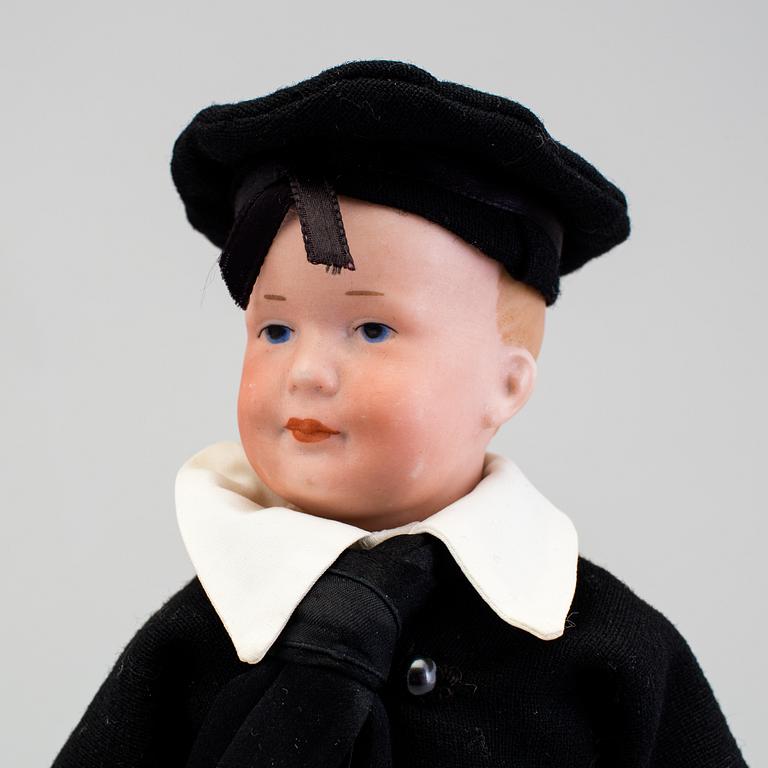 A bisque headed character doll 500 by Armand Marseille, Germany, ca 1910.