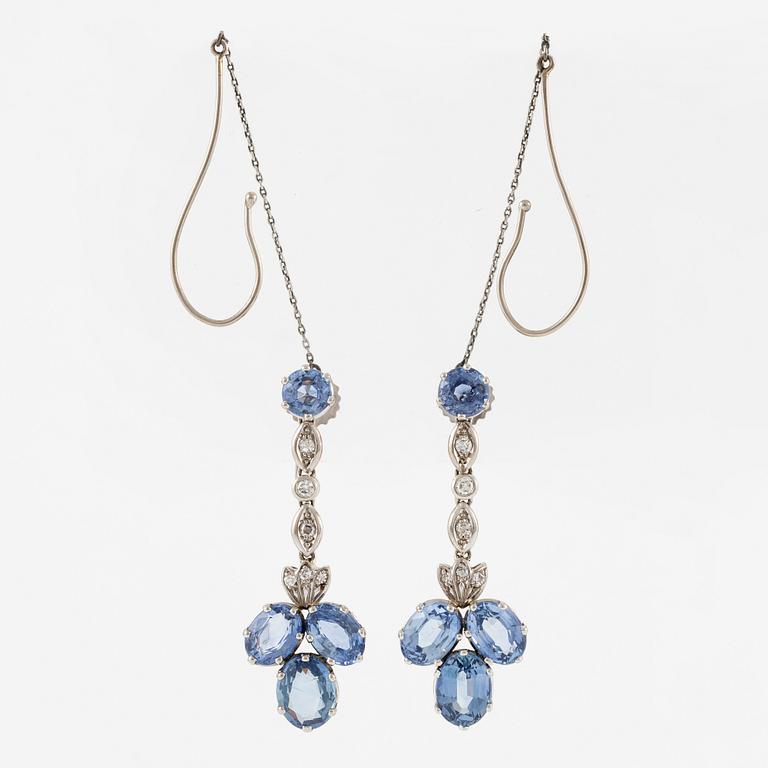 A pair of earrings with sapphires and diamonds, stamped Carlman.