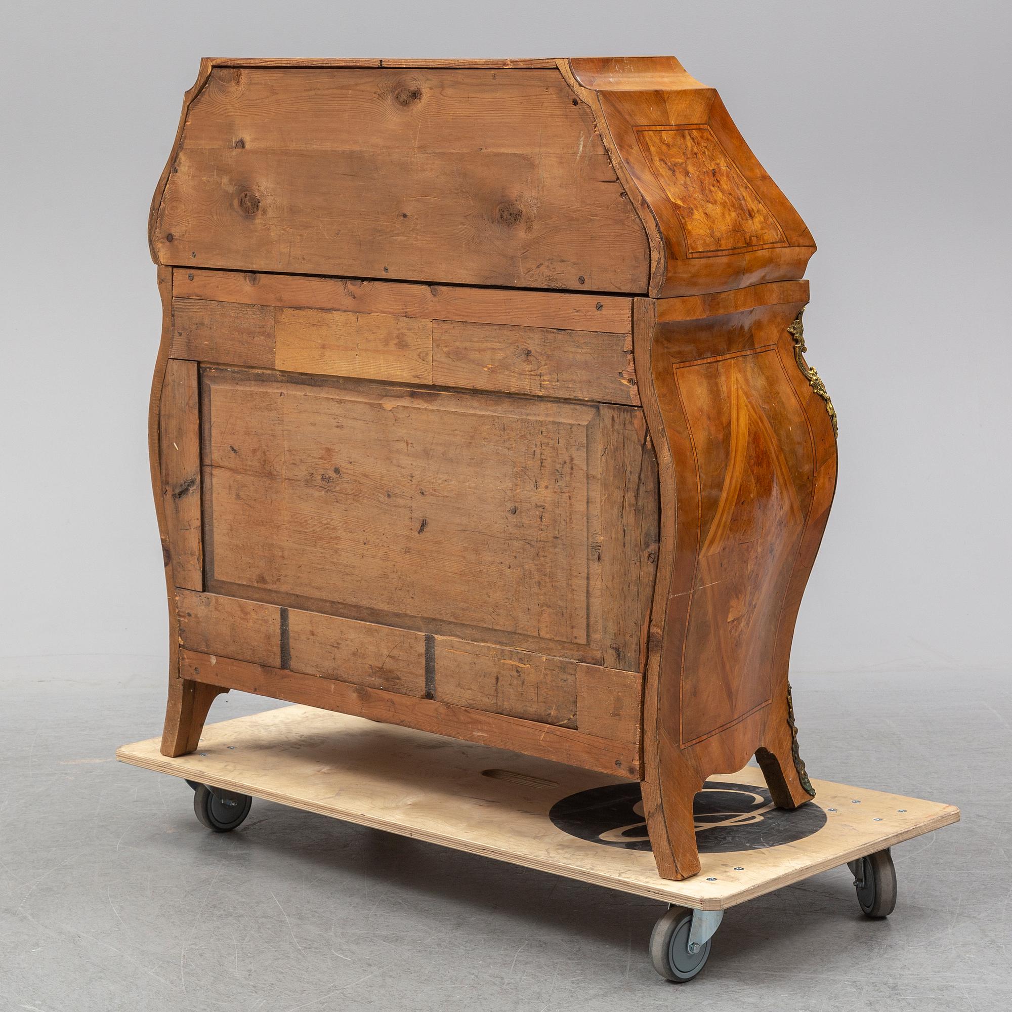 A 19th century rococo style secretaire.