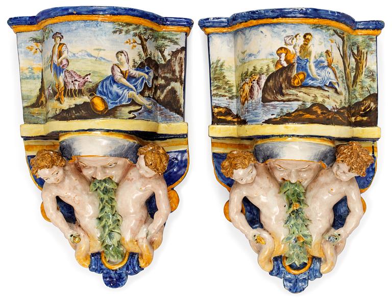 A pair of Italian Historatio wall bracket vases, 19th Century.