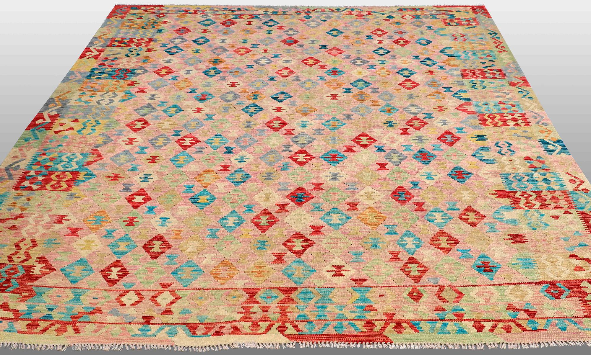 An oriental kilim, around 290 x 250 cm.
