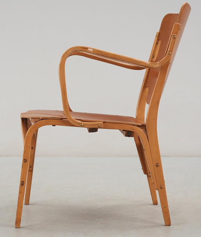 A Carl-Axel Acking mahogany and beech armchair, Svenska Möbelfabrikerna, Bodafors, Sweden 1940's.