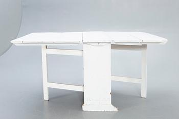 A painted folding table later part of the 19th century.