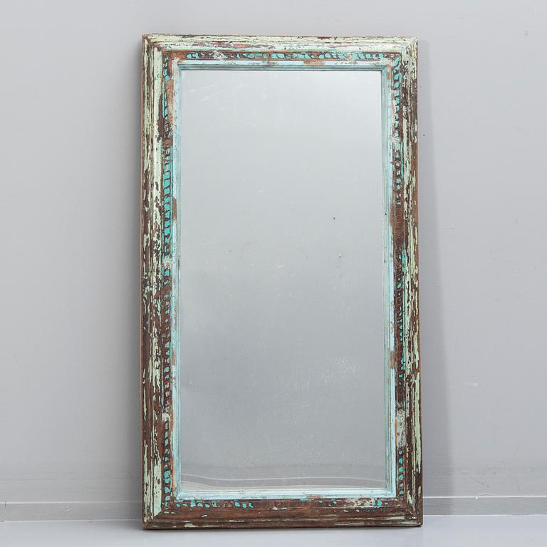 An Indian panted wood mirror 20th/21st century.